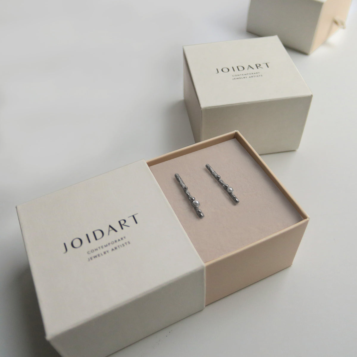 GUSPIRA EARRINGS SILVER