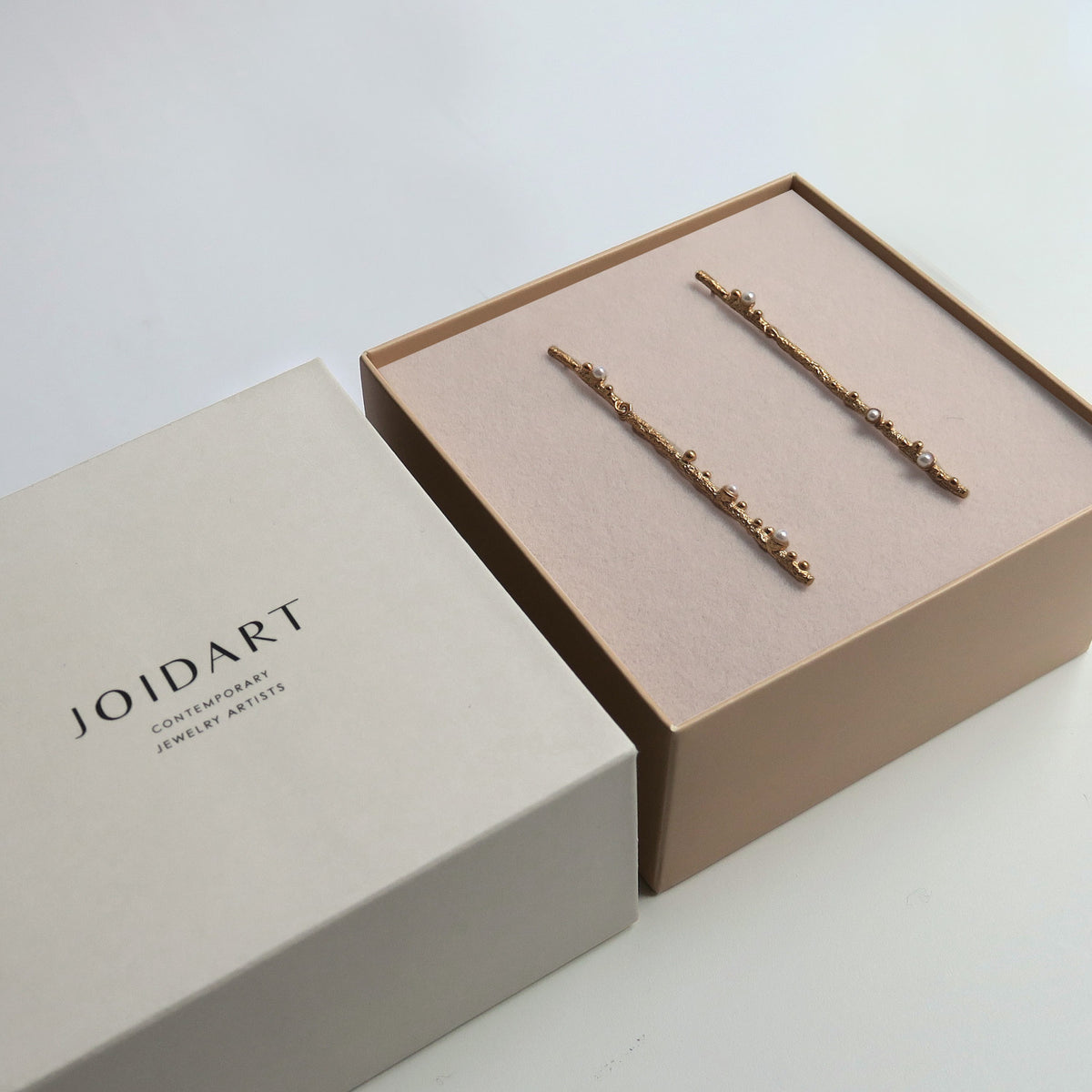 GUSPIRA EARRINGS LONG GOLD