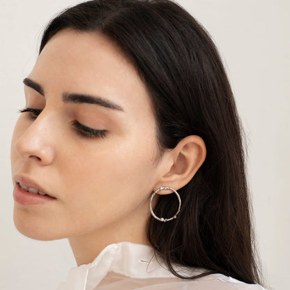 GUSPIRA EARRINGS CIRCULAR SILVER