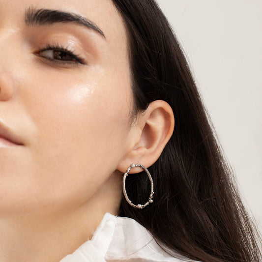GUSPIRA EARRINGS CIRCULAR SILVER