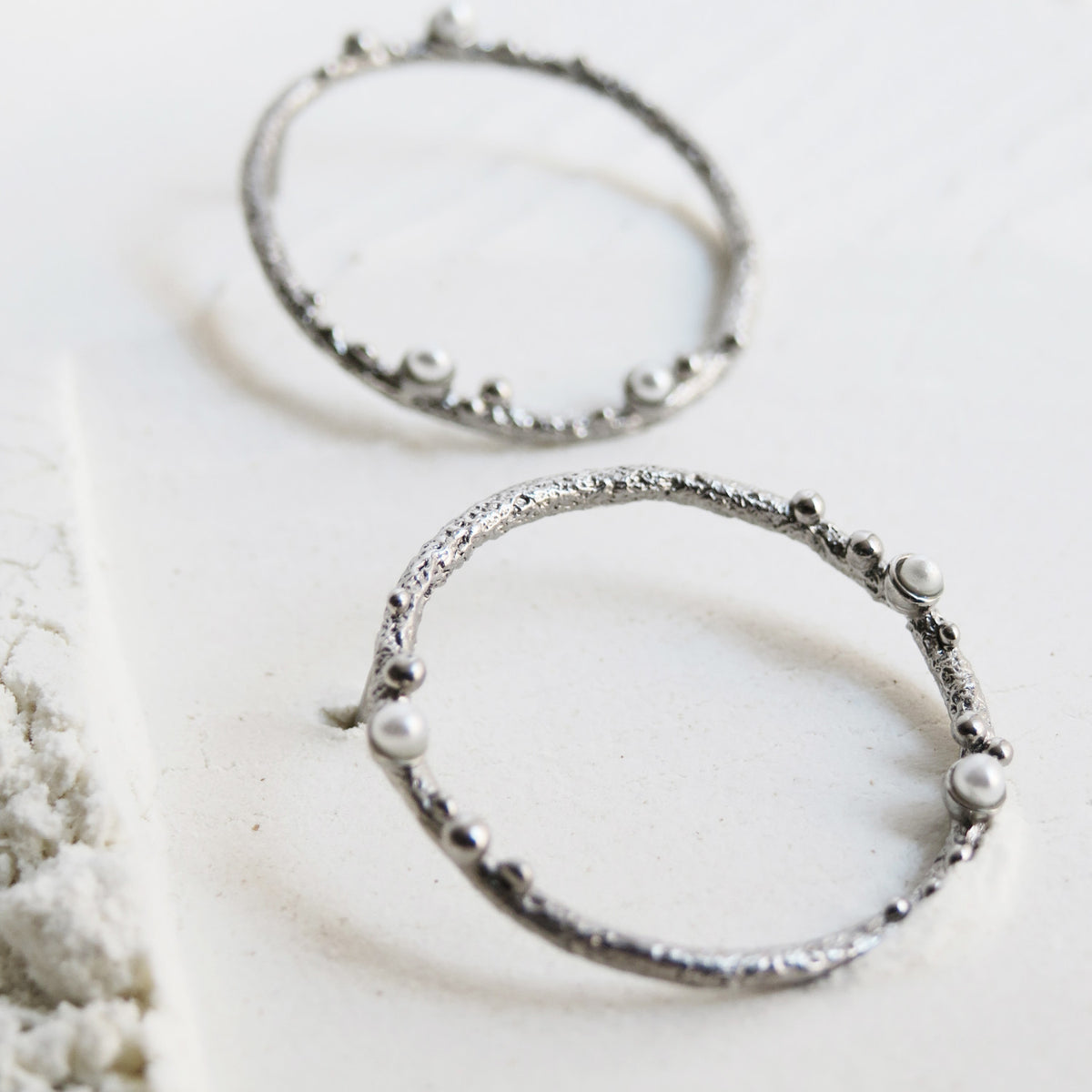 GUSPIRA EARRINGS CIRCULAR SILVER