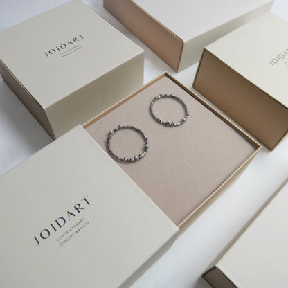 GUSPIRA EARRINGS CIRCULAR SILVER
