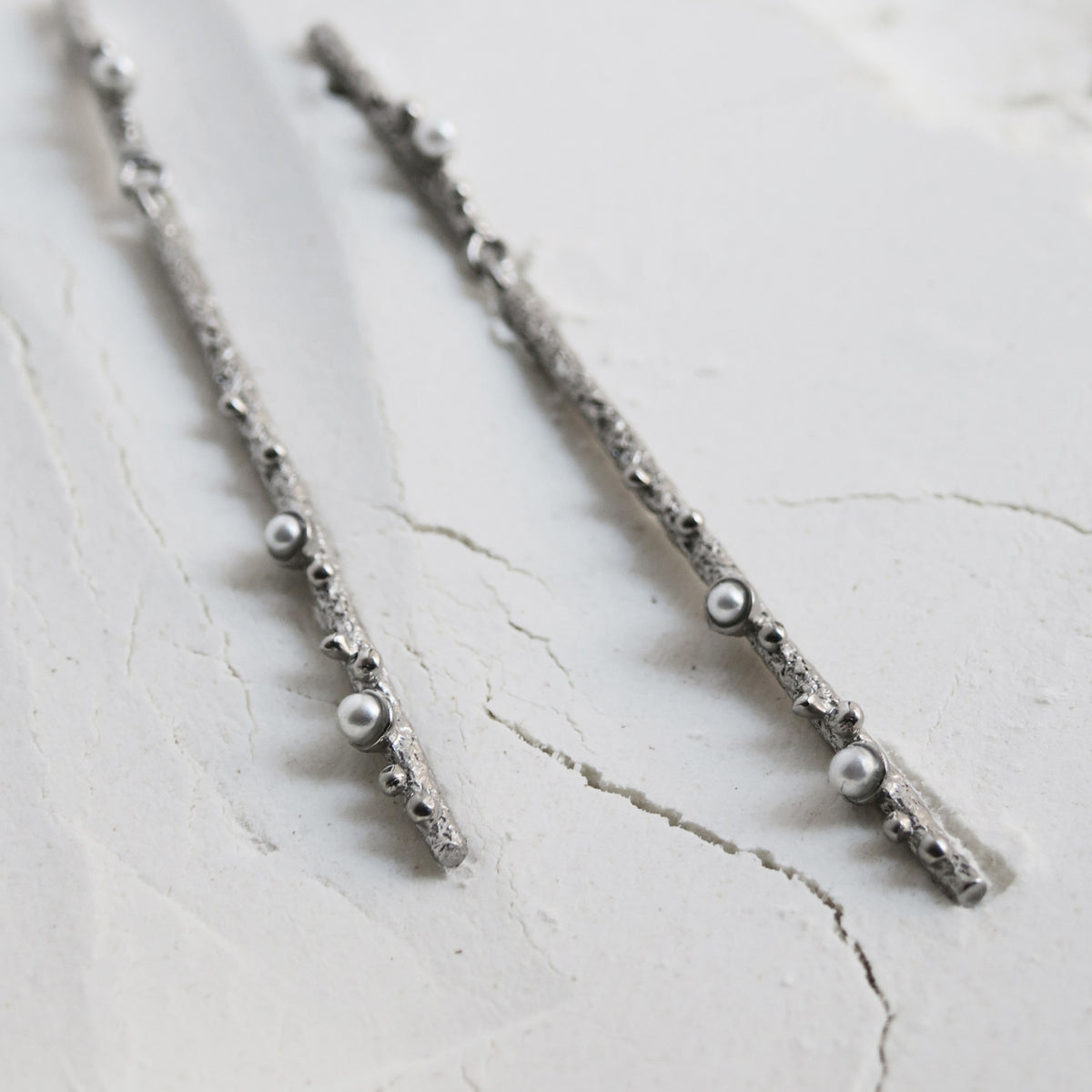 GUSPIRA EARRINGS LONG SILVER