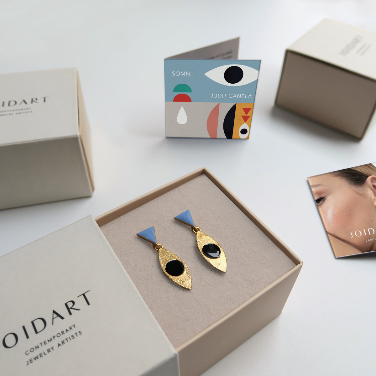 SOMNI EARRINGS BLUE TRIANGLE AND SPINDLE